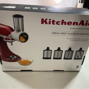 Kitchen Aid stand mixer attachments.  Fresh prep/shedder.